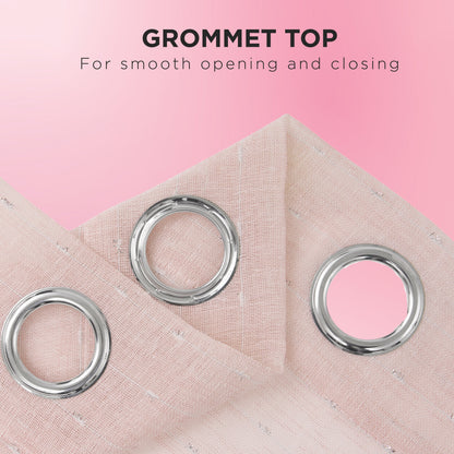 Close-up of an Aurora Sheer Window Curtain in light pink, featuring shiny silver grommets, shown on a pink background. Text above reads: GROMMET TOP - For smooth opening/closing. Perfect for adding style to your sheer curtains.