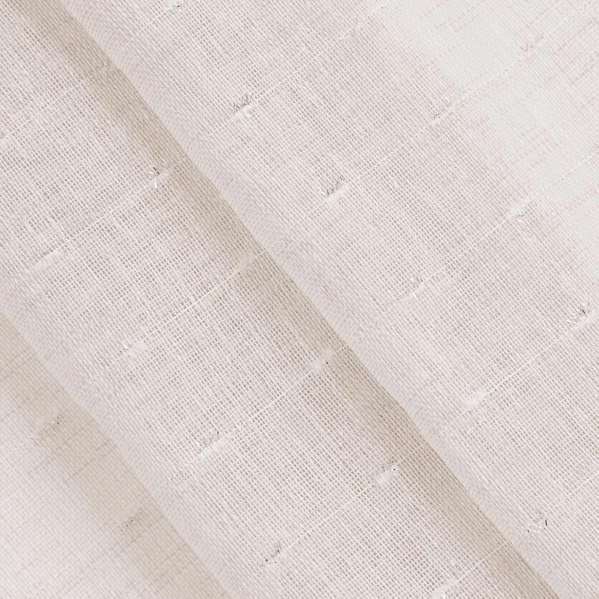 A close-up of the Aurora Sheer Window Curtain shows light beige, textured linen with a slightly open weave and visible threads, neatly folded in layers—perfect for creating soft, airy window treatments.