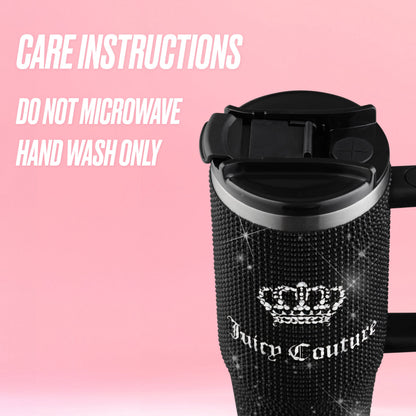 A Diamond Bling Stainless Steel Tumbler with Handle and Straw, 30 oz, adorned with rhinestones and featuring a crown logo labeled Juicy Couture, adds ultimate sparkle to your sip—capturing the glamour of a dazzling jeweled mug. Text on a pink background reads: “CARE INSTRUCTIONS: DO NOT MICROWAVE. HAND WASH ONLY.”.