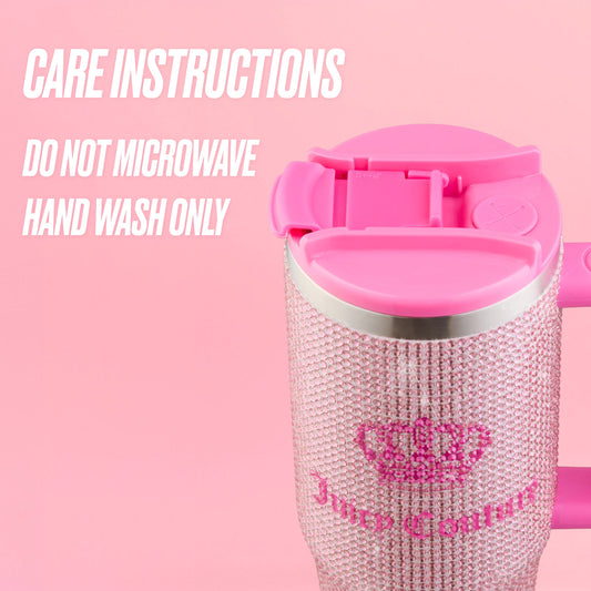 A pink, rhinestone-covered Diamond Bling Stainless Steel Tumbler with Handle and Straw, 30 oz, featuring a pink lid, sits against a pink background. Text reads: “Care instructions: Do not microwave. Hand wash only.”.