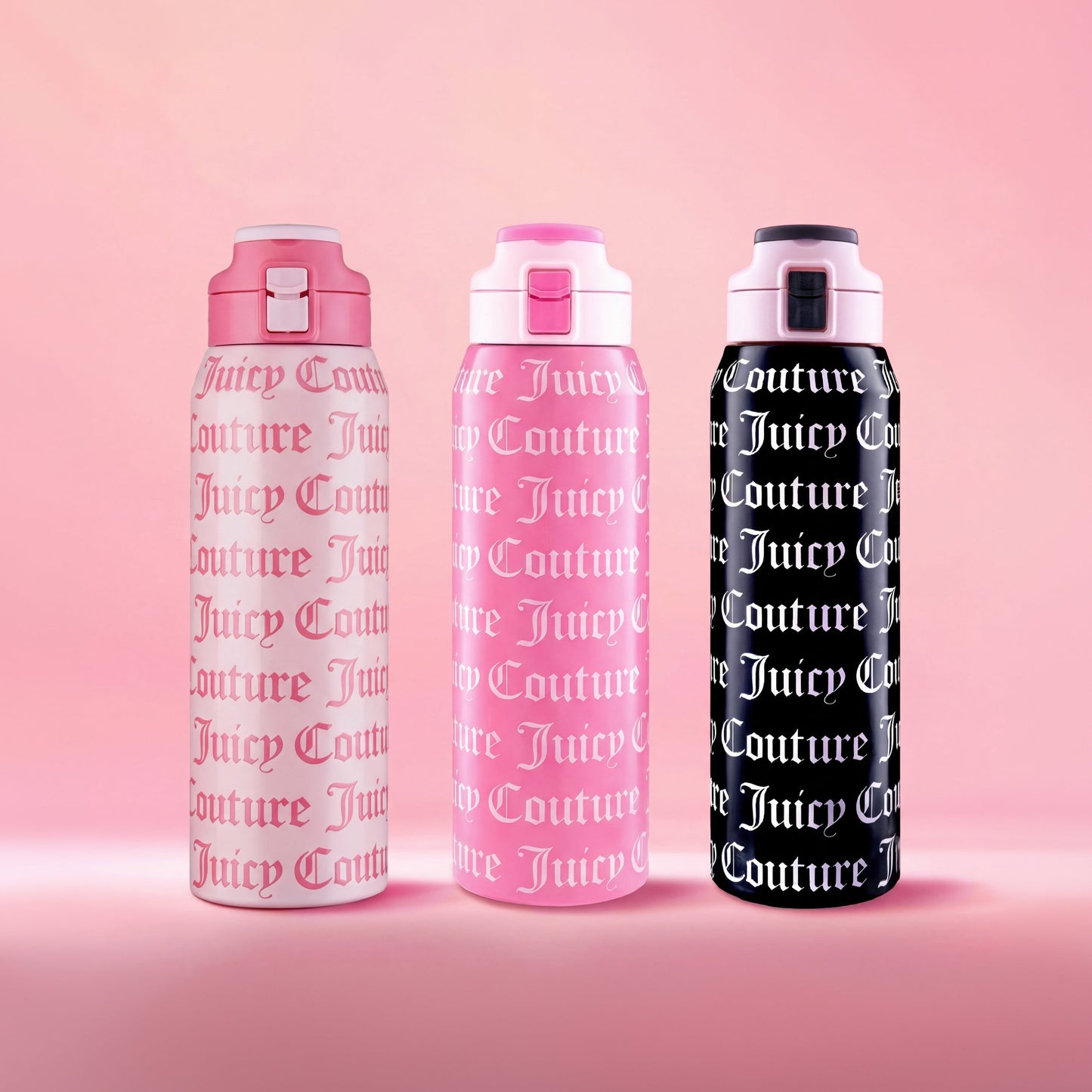 Three Glam Getaway Hydration Stainless Steel Tumblers stand side by side on a pink backdrop, each 32oz with the iconic logo in white, pink, and black color schemes, featuring matching flip-top lids.