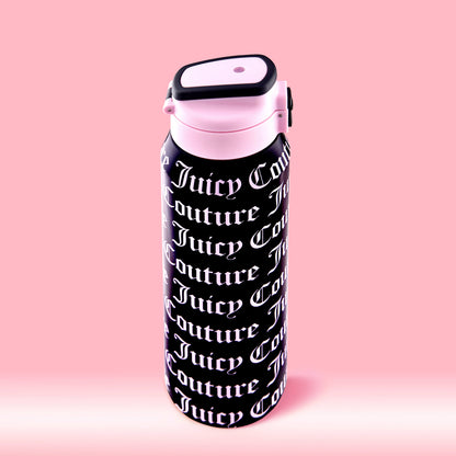 The Glam Getaway Hydration Stainless Steel Tumbler features a black and pink design, flip-top lid, and "Juicy Couture" in white gothic font. This 32oz stylish tumbler stands out against a pink gradient background.