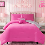 A twin bed featuring the Kids Rainbow Ombre Leopard Reversible Comforter Set and a star-shaped pillow makes a statement in this stylish kids bedroom. The headboard labeled JUICY PRINCESS perfectly complements the striped pink walls and LOVE art, while two lamps on light bedside tables complete this vibrant space.