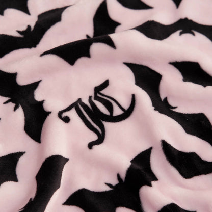 The Halloween Plush Throw Blanket 50" x 60" is a soft pink throw with black bats and a black WC monogram—ideal for Juicy Couture Halloween blanket fans or as stylish, cozy Halloween décor.