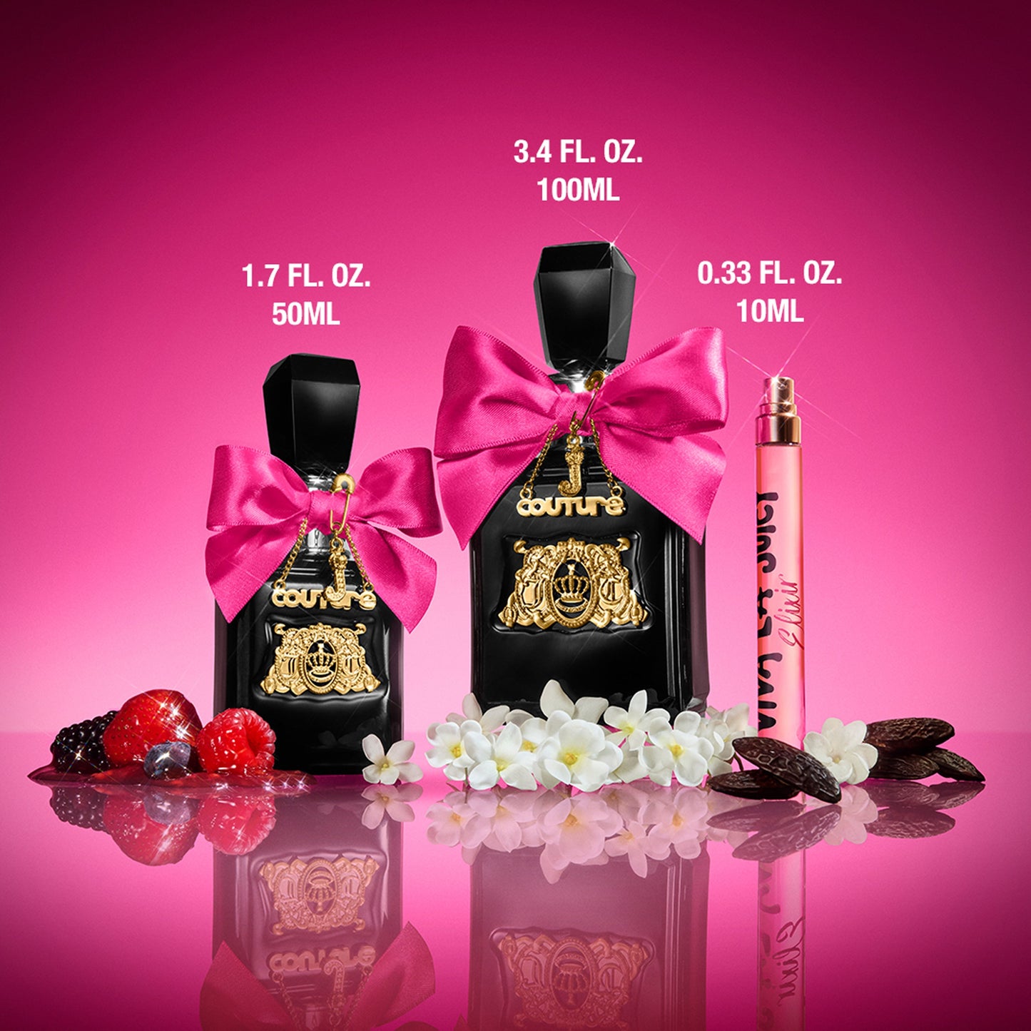Three bottles of Viva La Juicy Elixir perfume for women on a pink background with flowers, berries, and vanilla pods: two black bottles with gold details and pink bows (50ml & 100ml) plus one Viva La Juicy Elixir Eau de Parfum Spray Pen, 0.33 oz.
