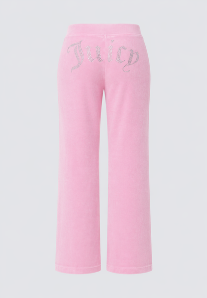 Back view of Big Bling Washed Terry Track Pants in pink, featuring a rhinestone "Juicy" logo across the back. These straight-leg pants offer a relaxed fit, adding casual beach-chic style to your look.