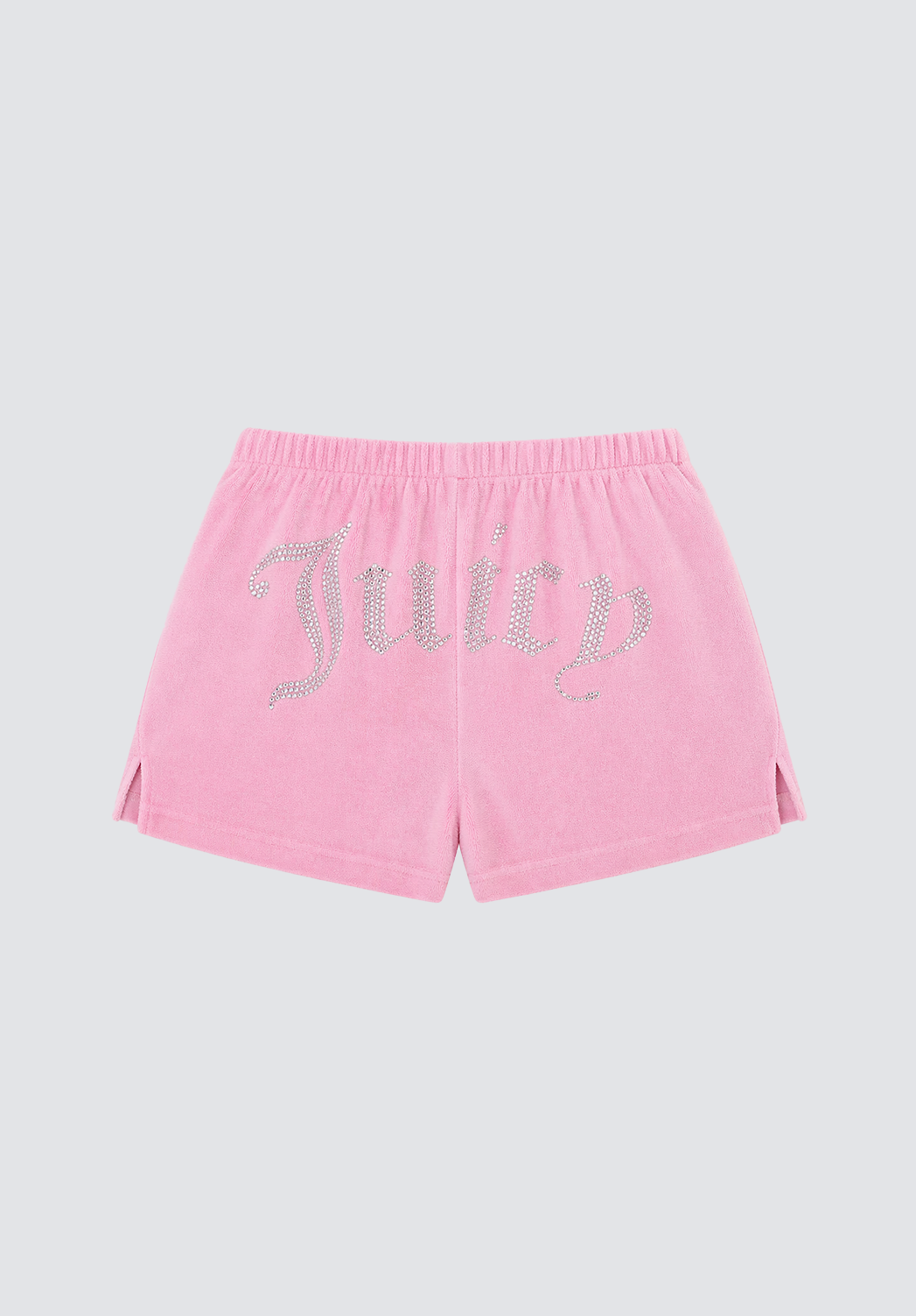 Big Bling Washed Terry Shorts feature pink velour, a drawstring waistband, small side slits, and "Juicy" spelled out in large, sparkling rhinestone logo letters across the back.
