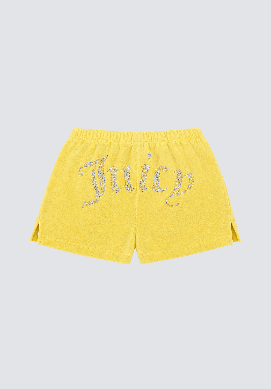 Big Bling Washed Terry Shorts in yellow, crafted from soft terry cloth with an elastic waistband, small side slits at the hem, and a rhinestone logo on the front. Shown on a plain light gray background.